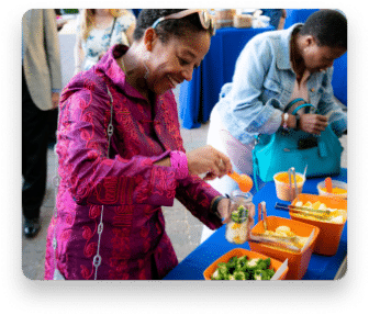 Guests serving themselves food at the Spring Melt